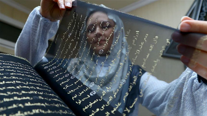 gold-black-silk-quran-tunzale-memmedzade-5